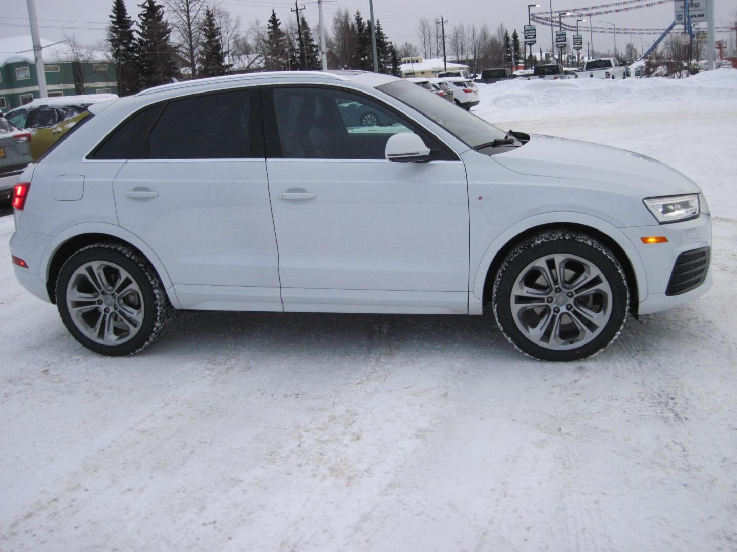 2018 white /black Audi Q3 sport premium plus (WA1HCCFS9JR) , located at 9530 Old Seward Highway, Anchorage, AK, 99515, (907) 349-3343, 61.134140, -149.865570 - Nice Audi Q3 front wheel drive come take a test drive - Photo#2